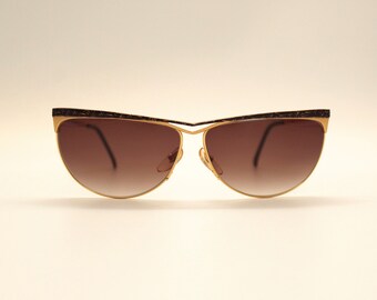 Vintage Casanova C O1 zonnebril, 24 karaat verguld, cat-eye rockabilly model, gemaakt in Italië, nieuw in doos.