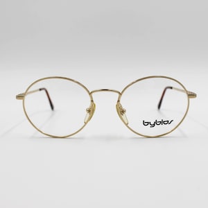 Vintage Eyewear Byblos mod. 591 authentic and rare oval metal frame wiht demo lenses Made in Italy New Old Stock teashades steampunk