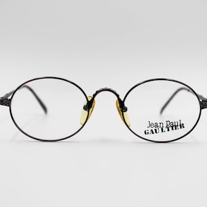 Vintage Eyewear frame Jean Paul Gaultier 56-9672 authentic and rare oval titan frame wiht demo lenses Made in Japan New Old Stock