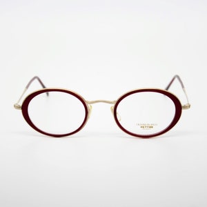 Vintage Eyewear frame Oliver Peoples OP 86 Los Angeles authentic and rare oval frame wiht demo lenses Made in Japan New Old Stock
