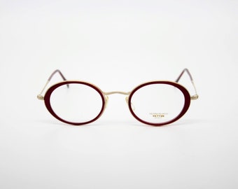 Vintage Eyewear frame Oliver Peoples OP 86 Los Angeles authentic and rare oval frame wiht demo lenses Made in Japan New Old Stock