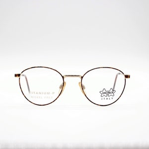 Vintage Eyewear frame  Luxottica Titanium - P authentic and rare panto round metal glasses wiht demo lenses Made in Italy New Old Stock