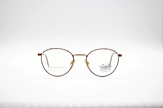 luxottica titanium eyeglass frames