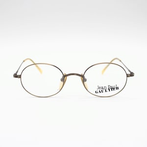 Vintage Eyewear frame Jean Paul Gaultier 55-1175 authentic and rare Oval round metal glasses wiht demo lenses Made in Japan New Old Stock