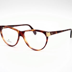 Vintage Eyewear Gucci GG 2131 authentic and rare Cat eye tortoise, wiht demo lenses Made in Italy New Old Stock