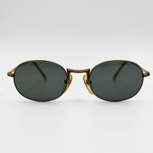 Vintage Sunglasses Jean Paul Gaultier 56 2172 authentic and rare oval round metal glasses wiht original lenses Made in Japan New Old Stock