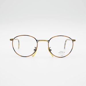 Vintage Eyewear Sting 4027 authentic and rare panto round metal frame wiht demo lenses Made in Italy New Old Stock steampunk