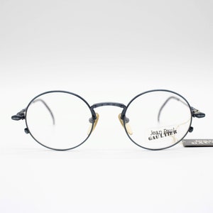 Vintage Eyewear frame Jean Paul Gaultier 55-4171 authentic and rare oval Pantos titan frame wiht demo lenses Made in Japan New Old Stock