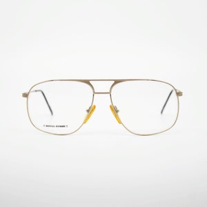 Vintage Eyewear frame Ferrari F 53 authentic and rare Aviator gold metal eyeglasses wiht demo lenses Made in Italy New Old Stock