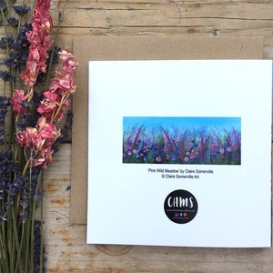 May include: A white card with a colorful painting of a field of wildflowers. The painting is titled "Pink Wild Meadow" by Claire Somerville. The card also includes the artist's website and social media handles.