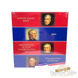 May include: A red, white, and blue box containing a 2009 United States Mint Presidential $1 Coin Uncirculated Set. The box features images of four presidents and the text "United States Mint", "Presidential $1 Coin Uncirculated Set", "2009", and "Philadelphia & Denver".