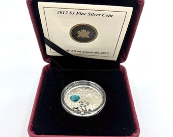 Serie de piedras de nacimiento canadienses 2012: Moneda de tres dólares de plata fina .9999 de diciembre con cristal Swarovski de 1/4 oz en caja con certificado de autenticidad / W2