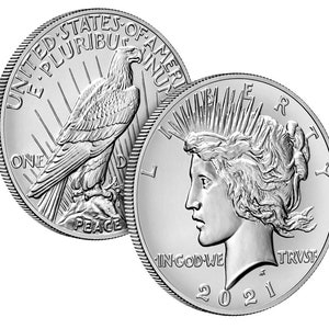 May include: Two silver American Peace dollar coins, one with an eagle on a branch and the inscription "E PLURIBUS UNUM", "UNITED STATES OF AMERICA", "ONE", and "PEACE", and the other with a profile of a woman with a crown of rays and the inscription "LIBERTY", "IN GOD WE TRUST", and "2021".