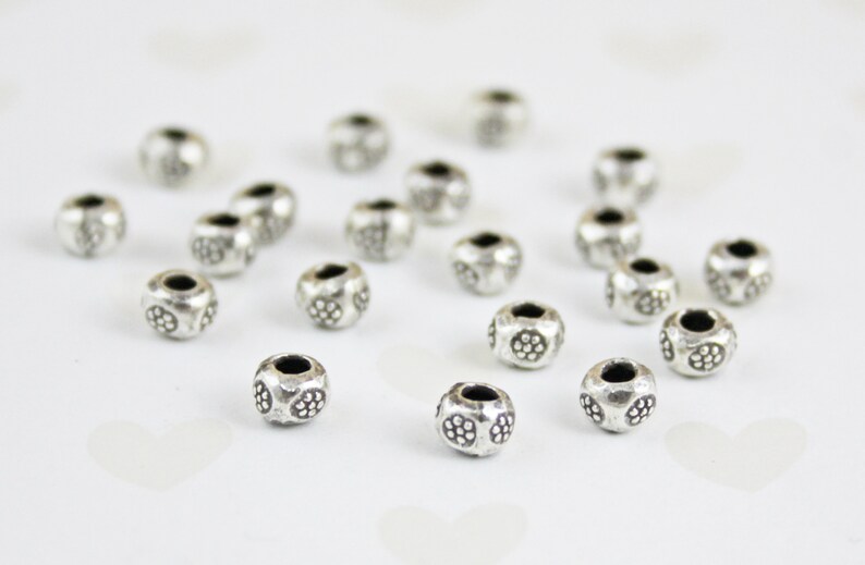 10 Per pkg 5 X 4 mm Karen Hill Tribe Silver 10 Daisy Print Rondelle Beads