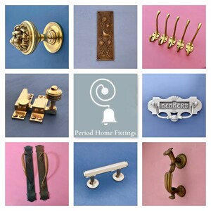 May include: A collection of antique-style door hardware and home fittings, including door knobs, handles, hooks, and a letter plate. The hardware is made of brass and silver and has a polished finish. The letter plate has the word "LETTERS" engraved on it.
