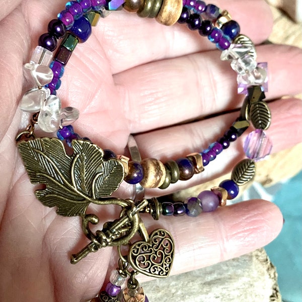 Grape Leaves. Handmade Beaded Double Wire Bracelet. Purple glass, Lepiodolite stones, Crystal and Fluorite Stones. Coconut, Shell & Bronze.