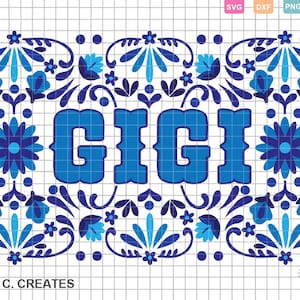 May include: A digital design featuring the name "GIGI" in bold, blue letters, framed by a decorative border of blue floral and leaf patterns. The design includes the text "GINA C. CREATES" at the bottom and SVG, DXF, PNG, and EPS file type icons.