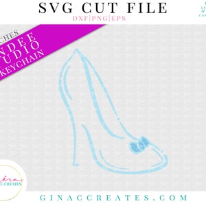 May include: A light blue glass slipper with a bow on the toe. The slipper is a 3 inch keychain that matches the ZinDee Studio brand.