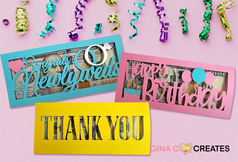 May include: Three colorful card holders with cut-out designs for cash gifts. The designs include "Congrats Newlyweds" with wedding rings, "Happy Birthday" with balloons, and "Thank You".