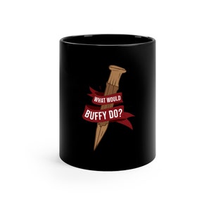 May include: Black ceramic mug featuring a white graphic of a wooden stake and the text "What would Buffy do?" in red.