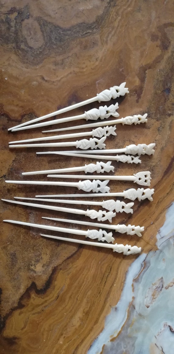 Antique ivory needles