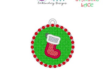 May include: A red and white Christmas stocking with a white fur cuff is embroidered on a green circle with a red border. The design is labeled "Free Standing Lace" and includes popular file types for embroidery machines.