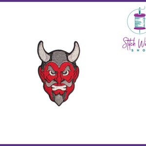 May include: Red and gray embroidered iron-on patch of a devil's face with horns.