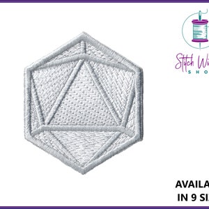 May include: A white embroidered patch in the shape of a 20-sided die, with a geometric design. The patch has a detailed, textured appearance. The text "AVAILABLE IN 9 SIZES" is at the bottom. The Stitch Wicked Shop logo is in the upper right corner.