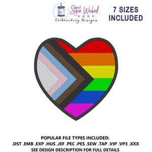 May include: A heart-shaped embroidery design featuring the Progress Pride flag. The design includes the traditional rainbow colors, along with the colors of the transgender flag and the colors representing marginalized communities of color. The text "7 SIZES INCLUDED" is also present.