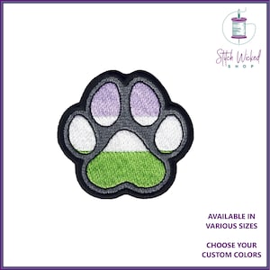 Peut inclure: Un patch brodé en forme de patte d'animal, dans les couleurs vert, blanc, violet et gris. Le patch est disponible en différentes tailles et couleurs personnalisées. Stitch Wicked Shop.