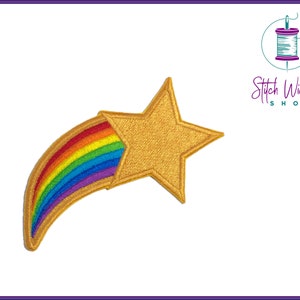 Peut inclure: Une étoile dorée avec un arc-en-ciel qui en sort. L'étoile est une étoile à cinq branches avec une surface légèrement texturée. L'arc-en-ciel est composé de rouge, orange, jaune, vert, bleu, indigo et violet.
