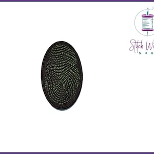 May include: Black and green embroidered patch with a fingerprint design.
