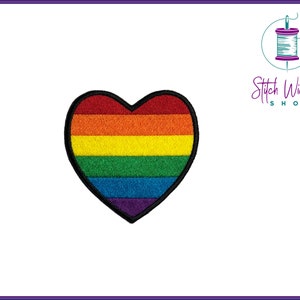 May include: Rainbow heart-shaped patch with red, orange, yellow, green, blue, and purple stripes.