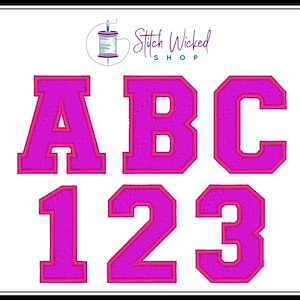 May include: A set of pink felt letters and numbers in a varsity style font. The letters are A, B, and C. The numbers are 1, 2, and 3.
