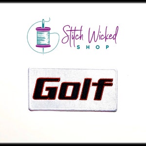 May include: White iron-on patch with a black outline and red fill. The patch says "Golf" in a bold, stylized font.