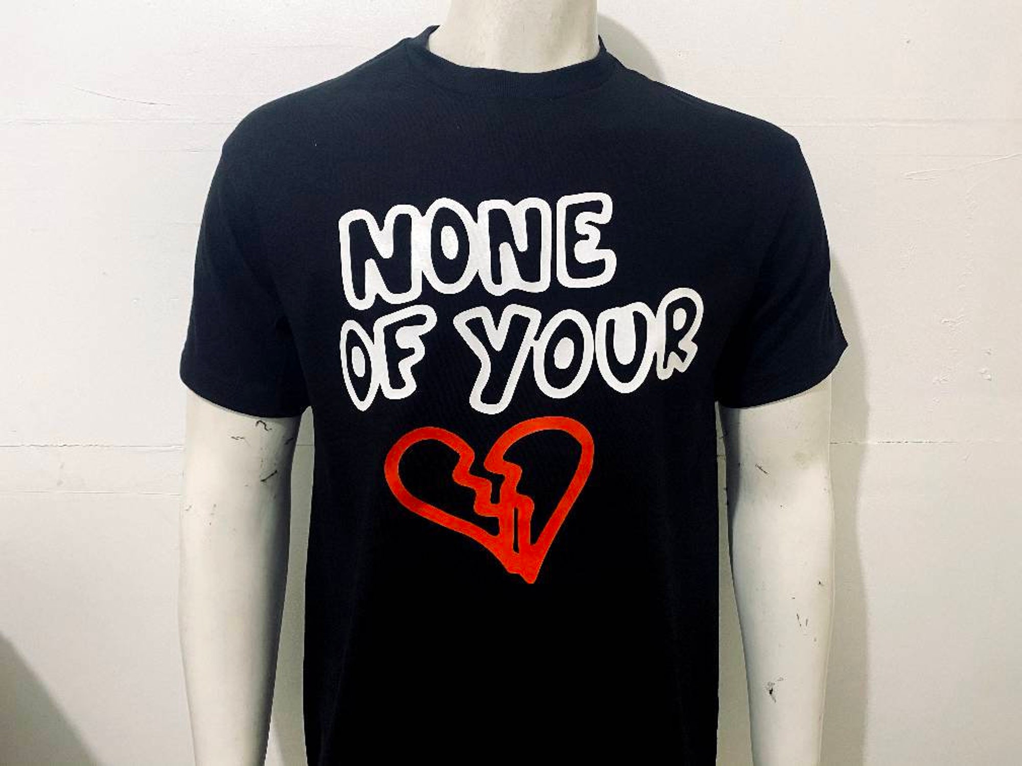 Discover Lil Tjay "None of Your Love" T-shirt