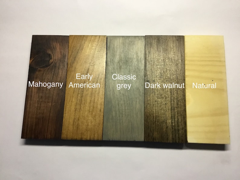 May include: Five wood samples stained in different colors: mahogany, early American, classic grey, dark walnut, and natural.