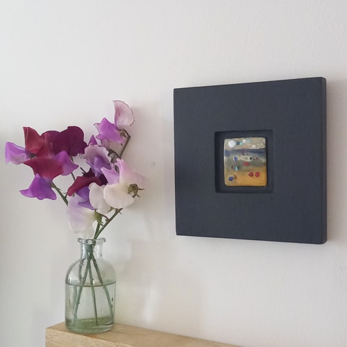 Abstract beach scene in copper and vitreous buying enamel. Displayed in a black handmade box frame