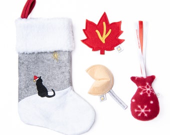 Christmas stocking for cats with 3 included toys (fortune cookie with "Santa" fortune, crinkly maple leaf, and fleece fish with ribbons)