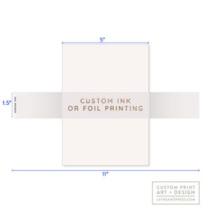 May include: A white rectangular card, 11 inches long and 5 inches wide, with a 1.5-inch adhesive tape. The text "CUSTOM INK OR FOIL PRINTING" is printed on the tape. The bottom right corner has the text "CUSTOM PRINT ART + DESIGN" and the website address.