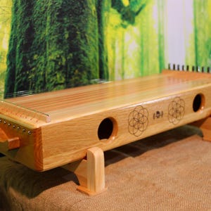 Monocordio: instrumento musical de cuerda pulsada para meditación, relajación, terapia de sonido, sanación con sonido y alivio del estrés.