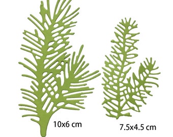 May include: Two green metal die-cut fern leaf shapes. The larger leaf is 10x6 cm and the smaller leaf is 7.5x4.5 cm.