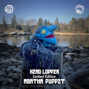 May include: A blue and red puppet with long blue hair, titled "Head Lopper Limited Edition Agatha Puppet" and the website "skeltoncrewstudio.com".