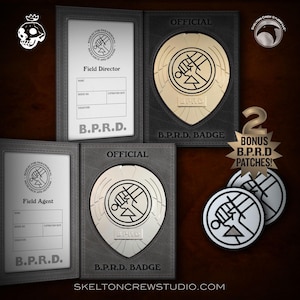 May include: Two black leather ID card holders with gold and silver badges featuring a stylised fist holding a sword. The badges have the text "B.P.R.D." and "OFFICIAL" printed on them. Two bonus B.P.R.D. patches are included.