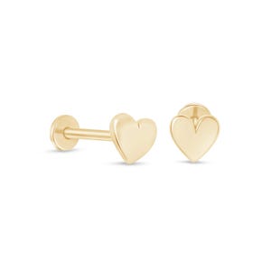 May include: A pair of gold-toned heart-shaped stud earrings with flat back posts. The earrings feature a smooth, polished finish and a simple, solid heart design. One earring is shown from the side, revealing the post, while the other is front-facing.