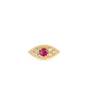 May include: A gold-colored, eye-shaped stud earring with a central ruby-colored stone and surrounding clear, round accent stones. The earring has a textured border and is set against a white background.