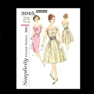 May include: A vintage Simplicity sewing pattern for a dress, pattern number 3045, Slenderette, size 40, bust 42. The pattern shows three different views of a woman wearing a dress. The dress is a light yellow color with a green sash and a pink flower.