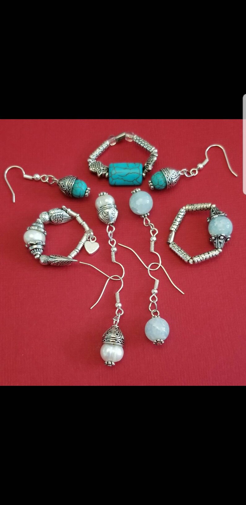 A Set of Earrings with a Flexible Ring StonePearlGlass From The New Original Zartical Collection