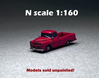 May include: A red N scale 1:160 pickup truck model. Models sold unpainted.