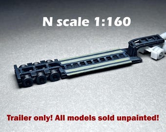 May include: N scale 1:160 black and gray trailer with a flatbed and wheels. Trailer only! All models sold unpainted.